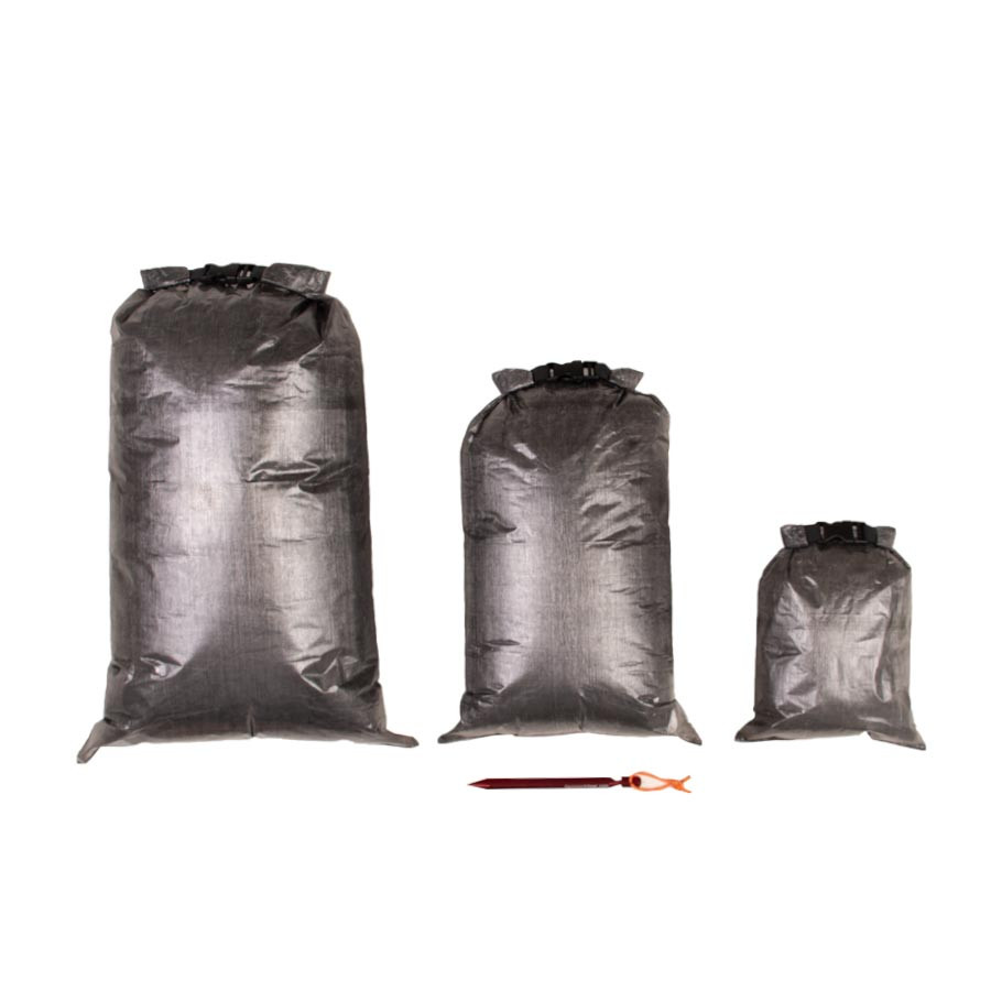 Examples of small, medium, and large sizes of filled Dyneema® Dry Bags.