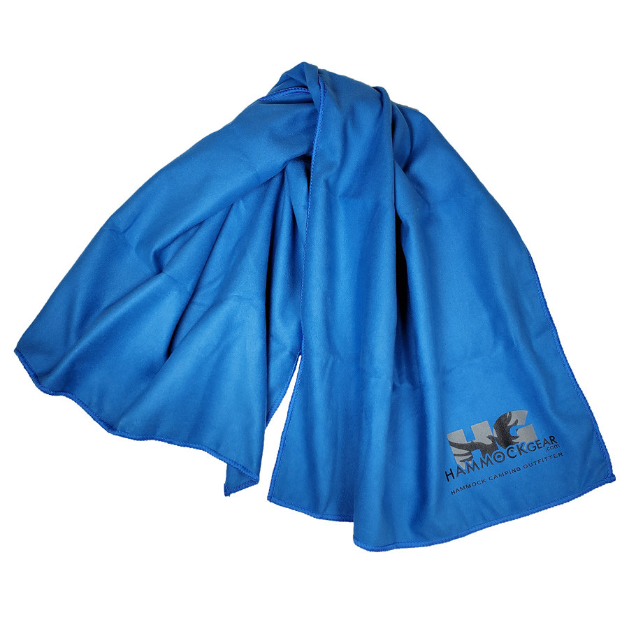 Deep blue microfiber camp towel with the Hammock Gear logo at the bottom of one end.